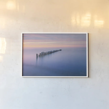 Lake Superior Old Pier IV by Alan Majchrowicz. shown as a paper print in a white frame. Available as a archival giclee rolled canvas, fine art paper, or poster print. SKU 50406i.
