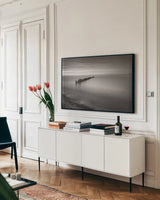 Lake Superior Old Pier V by Alan Majchrowicz. shown as a framed stretched canvas in a living room above a console. Available as a archival giclee rolled canvas, fine art paper, or poster print. SKU 50407i.