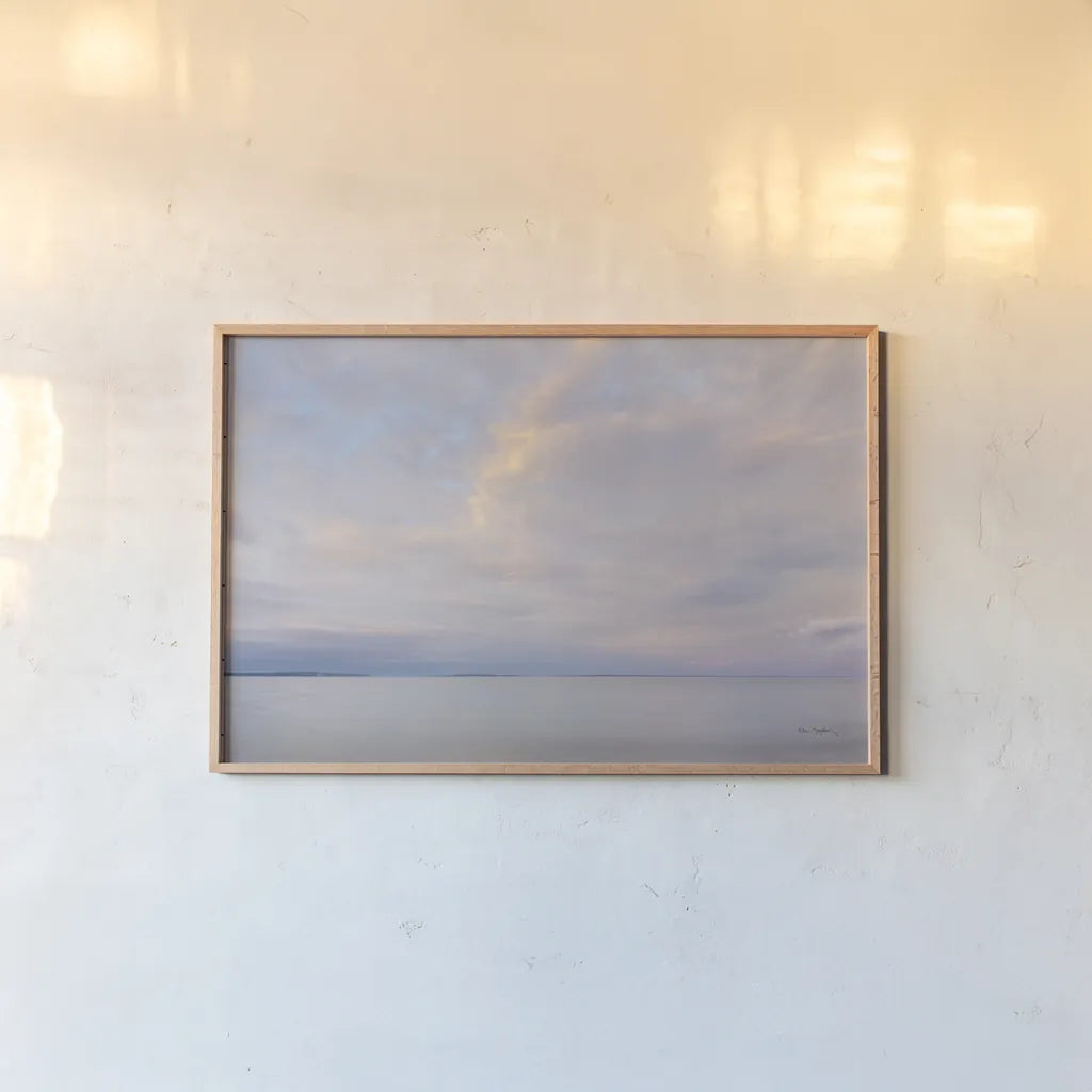 Lake Superior Sky VI by Alan Majchrowicz. shown as a paper print in a natural frame. Available as a archival giclee rolled canvas, fine art paper, or poster print. SKU 62892i.