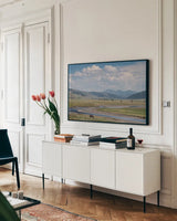 Lamar Valley Bison by Alan Majchrowicz. shown as a framed stretched canvas in a living room above a console. Available as a archival giclee rolled canvas, fine art paper, or poster print. SKU 80847i.