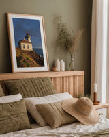 Lime Kiln Lighthouse by Alan Majchrowicz. shown as a paper print in a natural frame. Available as a archival giclee rolled canvas, fine art paper, or poster print. SKU 86301h.