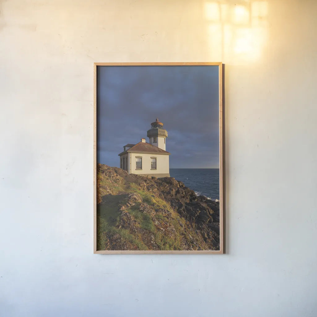 Lime Kiln Lighthouse by Alan Majchrowicz. shown as a paper print in a natural frame. Available as a archival giclee rolled canvas, fine art paper, or poster print. SKU 86301h.