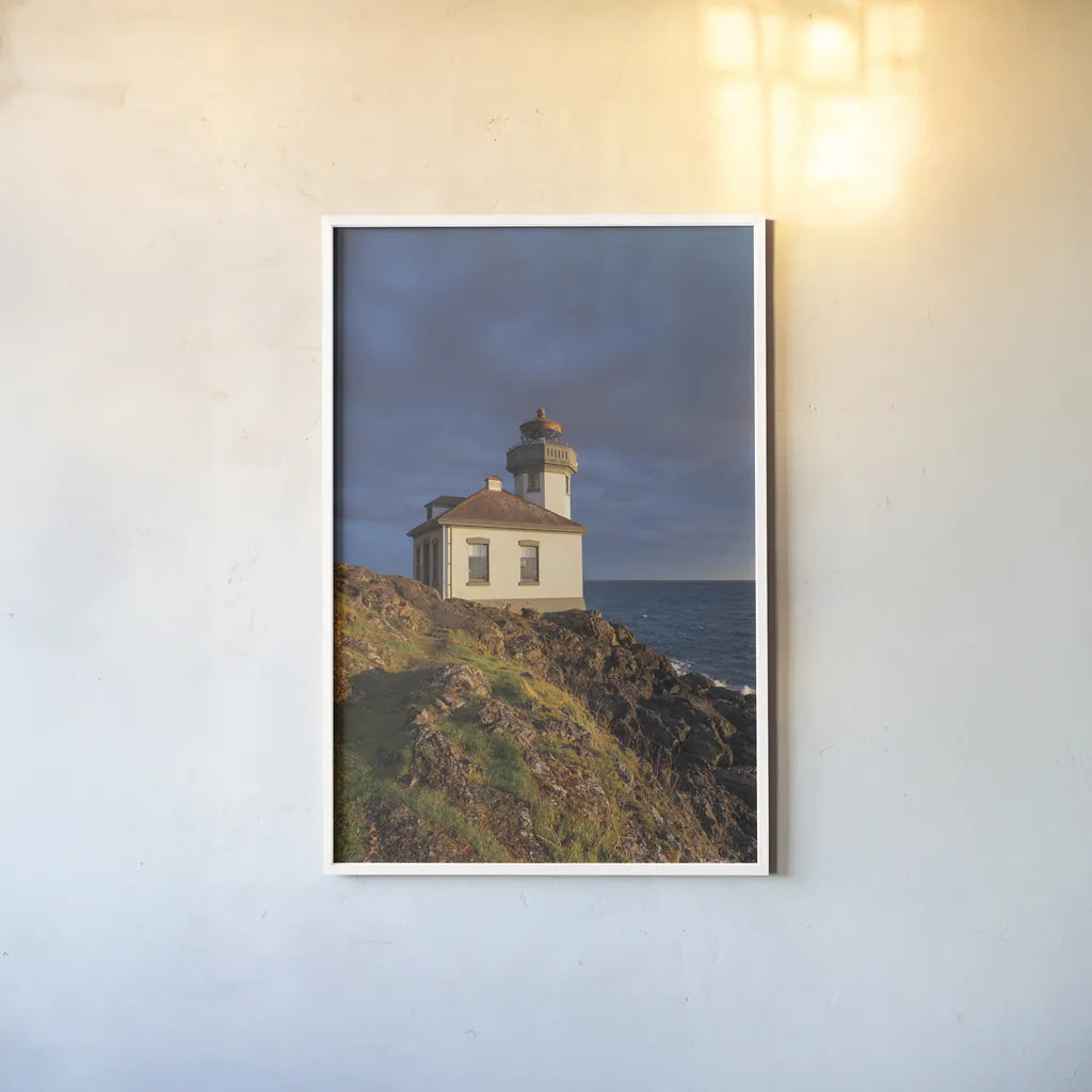 Lime Kiln Lighthouse by Alan Majchrowicz. shown as a paper print in a white frame. Available as a archival giclee rolled canvas, fine art paper, or poster print. SKU 86301h.
