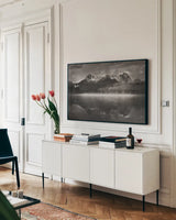 Little Redfish Lake Mist II by Alan Majchrowicz. shown as a framed stretched canvas in a living room above a console. Available as a archival giclee rolled canvas, fine art paper, or poster print. SKU 64552i.