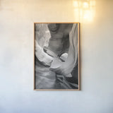 Lower Antelope Canyon IX BW by Alan Majchrowicz. shown as a paper print in a natural frame. Available as a archival giclee rolled canvas, fine art paper, or poster print. SKU 53662h.
