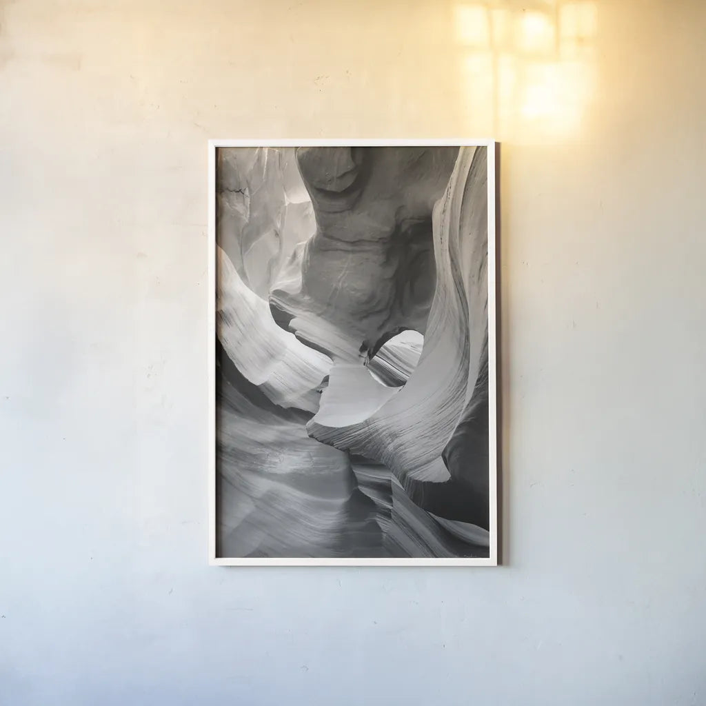 Lower Antelope Canyon IX BW by Alan Majchrowicz. shown as a paper print in a white frame. Available as a archival giclee rolled canvas, fine art paper, or poster print. SKU 53662h.