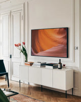 Lower Antelope Canyon VI by Alan Majchrowicz. shown as a framed stretched canvas in a living room above a console. Available as a archival giclee rolled canvas, fine art paper, or poster print. SKU 53275i.