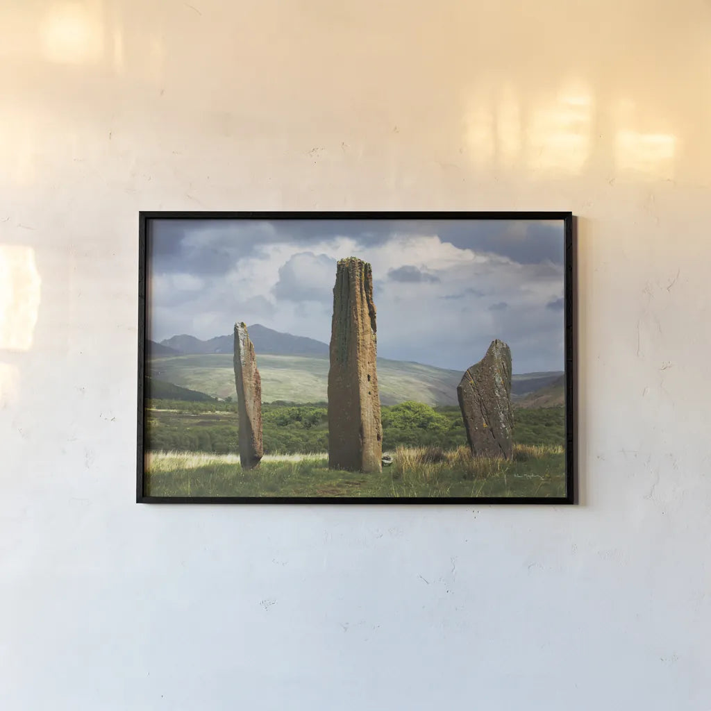 Machrie Moor Standing Stones by Alan Majchrowicz. shown as a paper print in a black flame. Available as a archival giclee rolled canvas, fine art paper, or poster print. SKU 84033i.