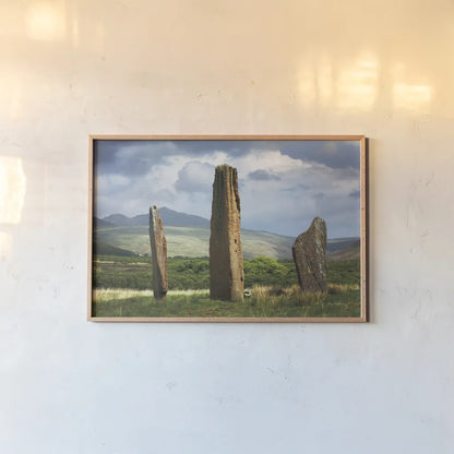 Machrie Moor Standing Stones by Alan Majchrowicz. shown as a paper print in a natural frame. Available as a archival giclee rolled canvas, fine art paper, or poster print. SKU 84033i.