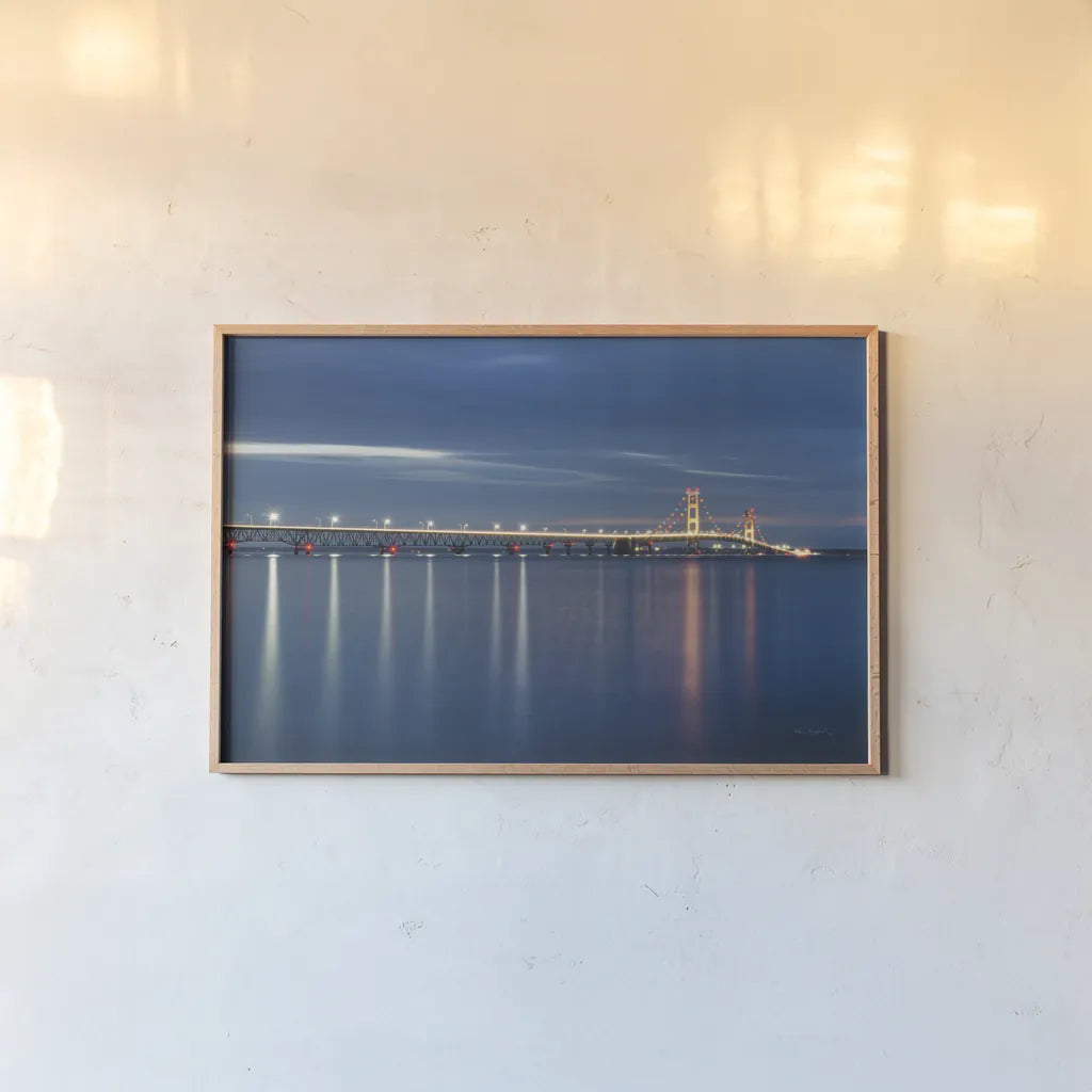 Mackinac Bridge by Alan Majchrowicz. shown as a paper print in a natural frame. Available as a archival giclee rolled canvas, fine art paper, or poster print. SKU 50603i.
