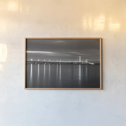 Mackinac Bridge BW by Alan Majchrowicz. shown as a paper print in a natural frame. Available as a archival giclee rolled canvas, fine art paper, or poster print. SKU 50604i.