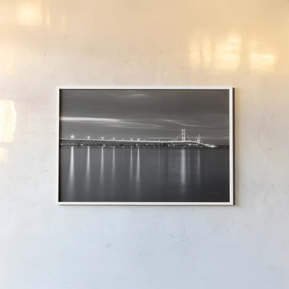 Mackinac Bridge BW by Alan Majchrowicz. shown as a paper print in a white frame. Available as a archival giclee rolled canvas, fine art paper, or poster print. SKU 50604i.