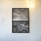 Makoshika Badlands by Alan Majchrowicz. shown as a paper print in a black flame. Available as a archival giclee rolled canvas, fine art paper, or poster print. SKU 88890h.