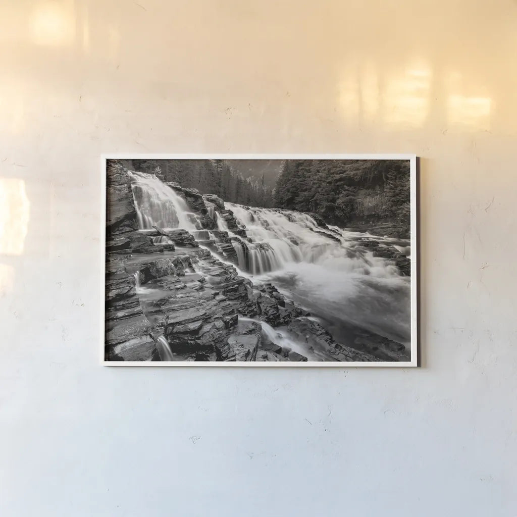McDonald Creek Falls by Alan Majchrowicz. shown as a paper print in a white frame. Available as a archival giclee rolled canvas, fine art paper, or poster print. SKU 27787i.