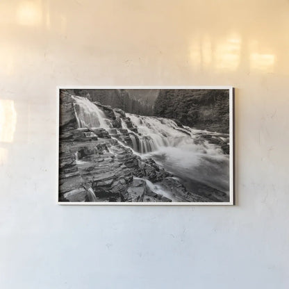 McDonald Creek Falls by Alan Majchrowicz. shown as a paper print in a white frame. Available as a archival giclee rolled canvas, fine art paper, or poster print. SKU 27787i.