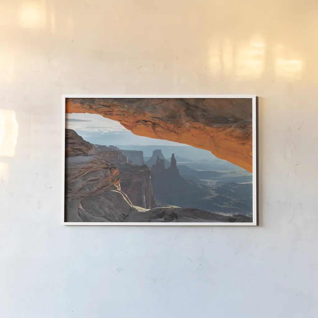 Mesa Arch Canyonlands National Park by Alan Majchrowicz. shown as a paper print in a white frame. Available as a archival giclee rolled canvas, fine art paper, or poster print. SKU 80815i.