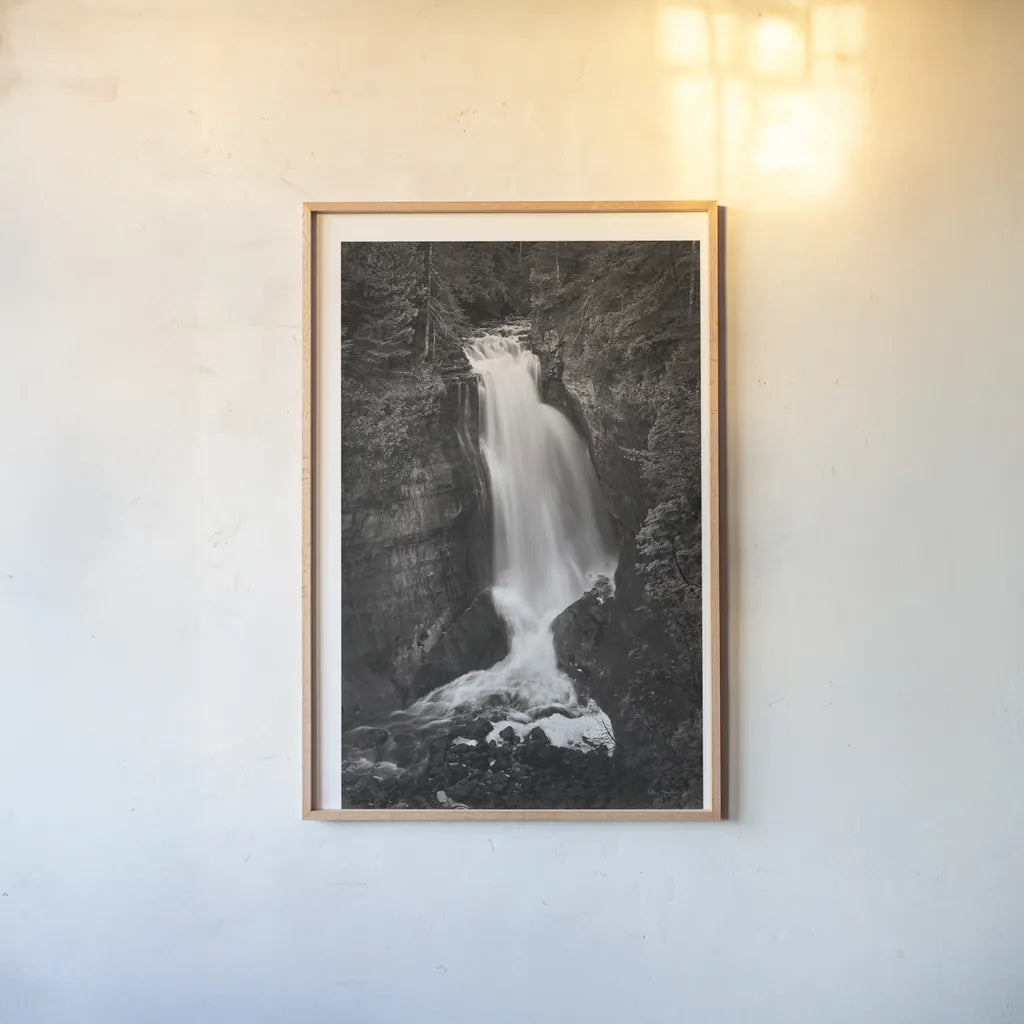 Miners Falls Michigan BW by Alan Majchrowicz. shown as a paper print in a natural frame. Available as a archival giclee rolled canvas, fine art paper, or poster print. SKU 50166h.