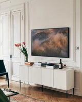 Misty North Cascades by Alan Majchrowicz. shown as a framed stretched canvas in a living room above a console. Available as a archival giclee rolled canvas, fine art paper, or poster print. SKU 84032i.