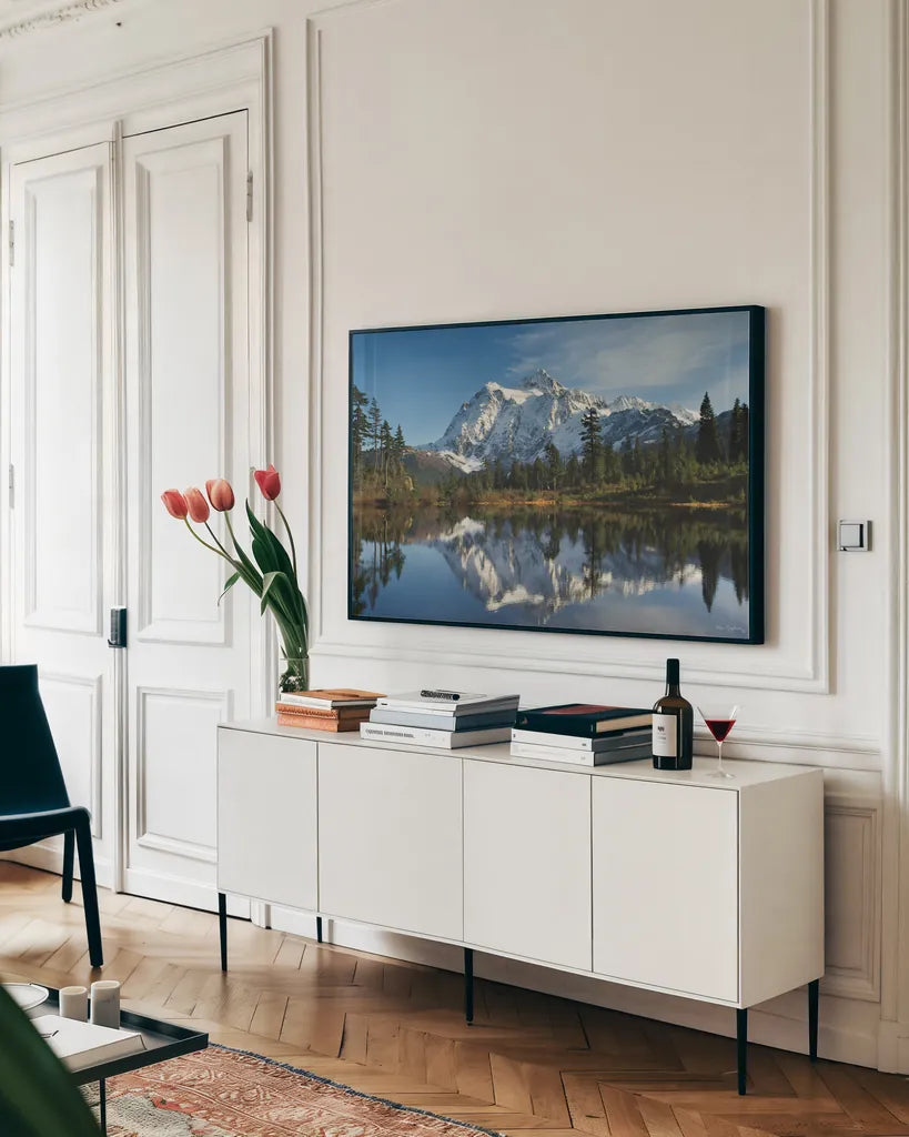 Mount Shukan Reflection I by Alan Majchrowicz. shown as a framed stretched canvas in a living room above a console. Available as a archival giclee rolled canvas, fine art paper, or poster print. SKU 28101i.