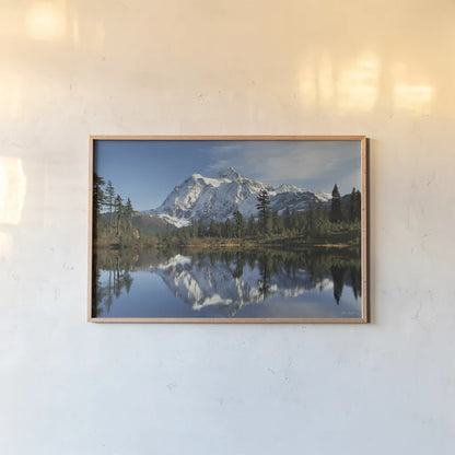 Mount Shukan Reflection I by Alan Majchrowicz. shown as a paper print in a natural frame. Available as a archival giclee rolled canvas, fine art paper, or poster print. SKU 28101i.