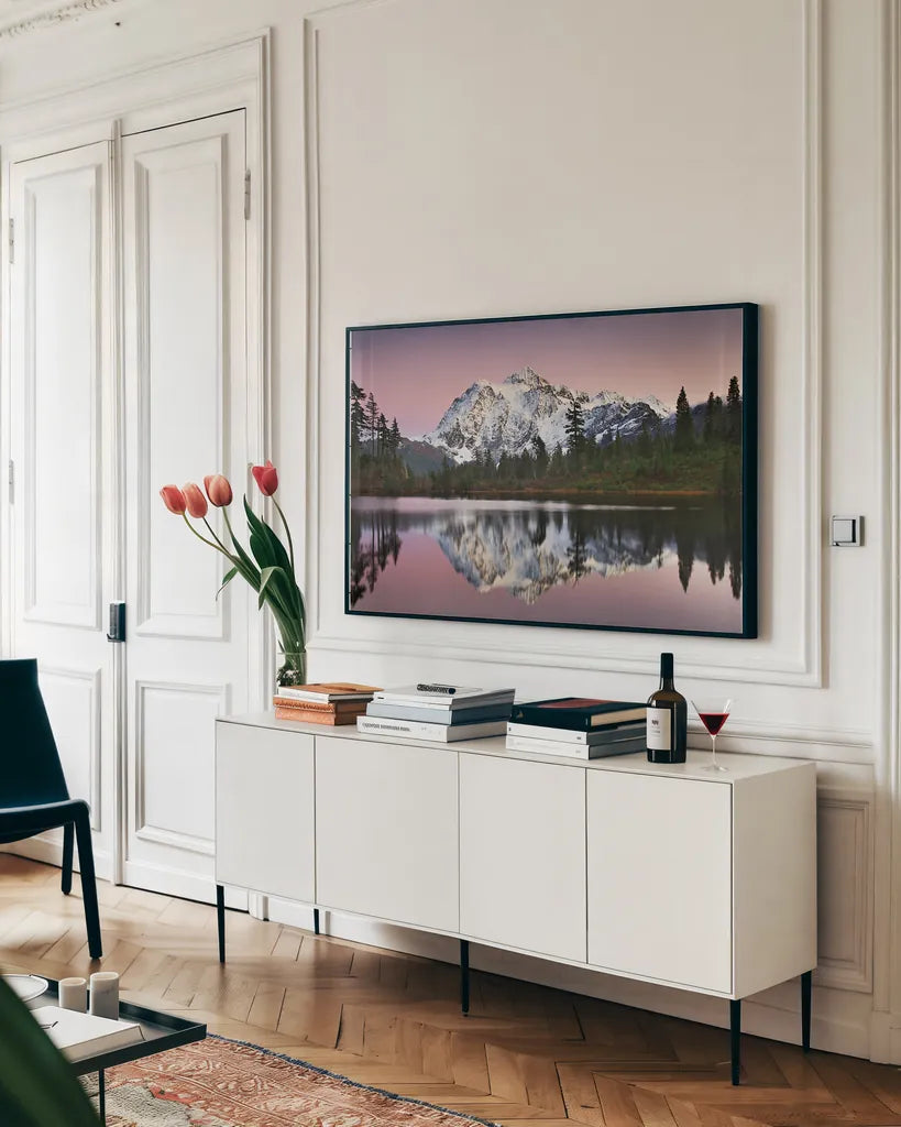 Mount Shukan Reflection II by Alan Majchrowicz. shown as a framed stretched canvas in a living room above a console. Available as a archival giclee rolled canvas, fine art paper, or poster print. SKU 28102i.