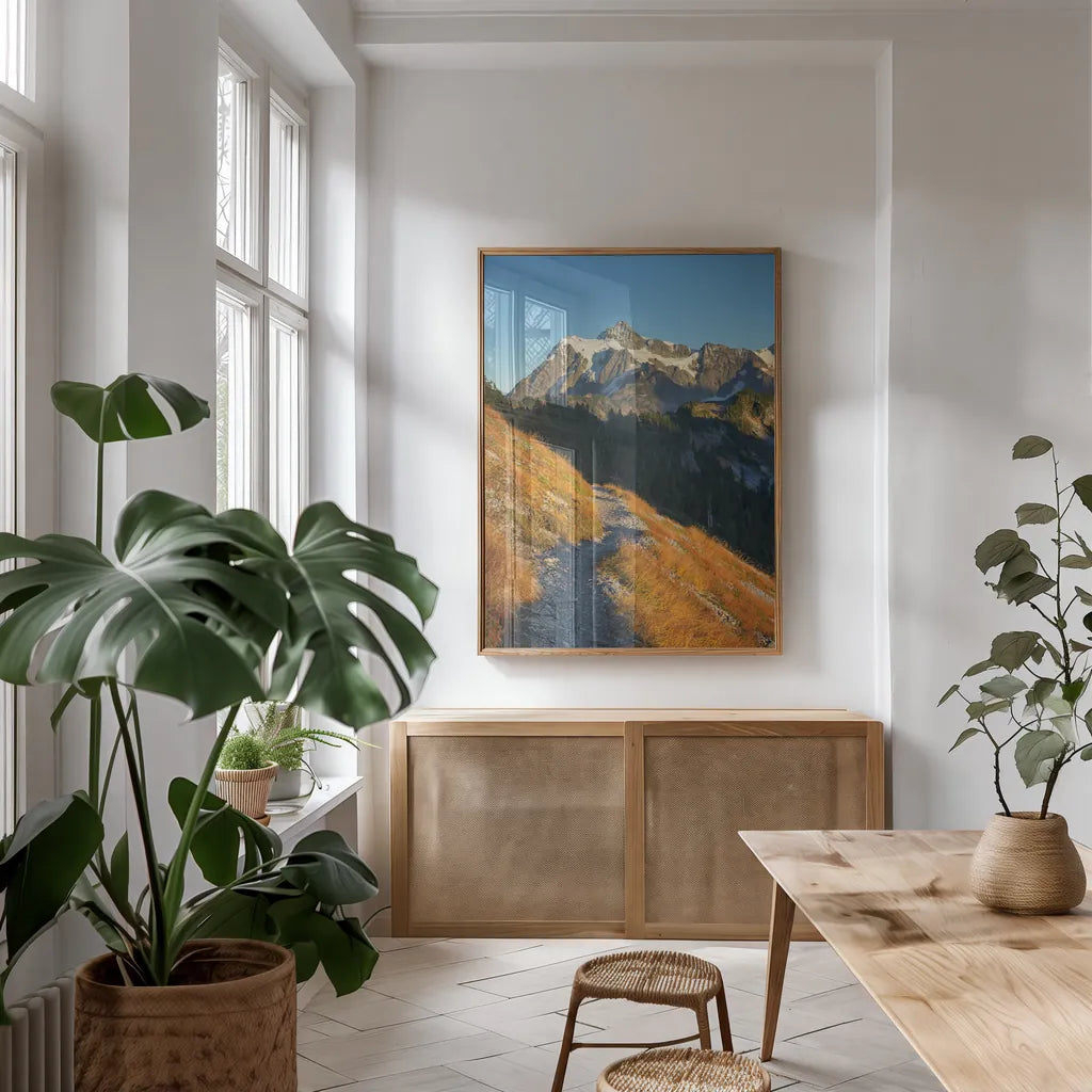 Mount Shuksan North Cascades by Alan Majchrowicz. shown as a print in a natural wood frame in a dining room. Available as a archival giclee rolled canvas, fine art paper, or poster print. SKU 62394h.