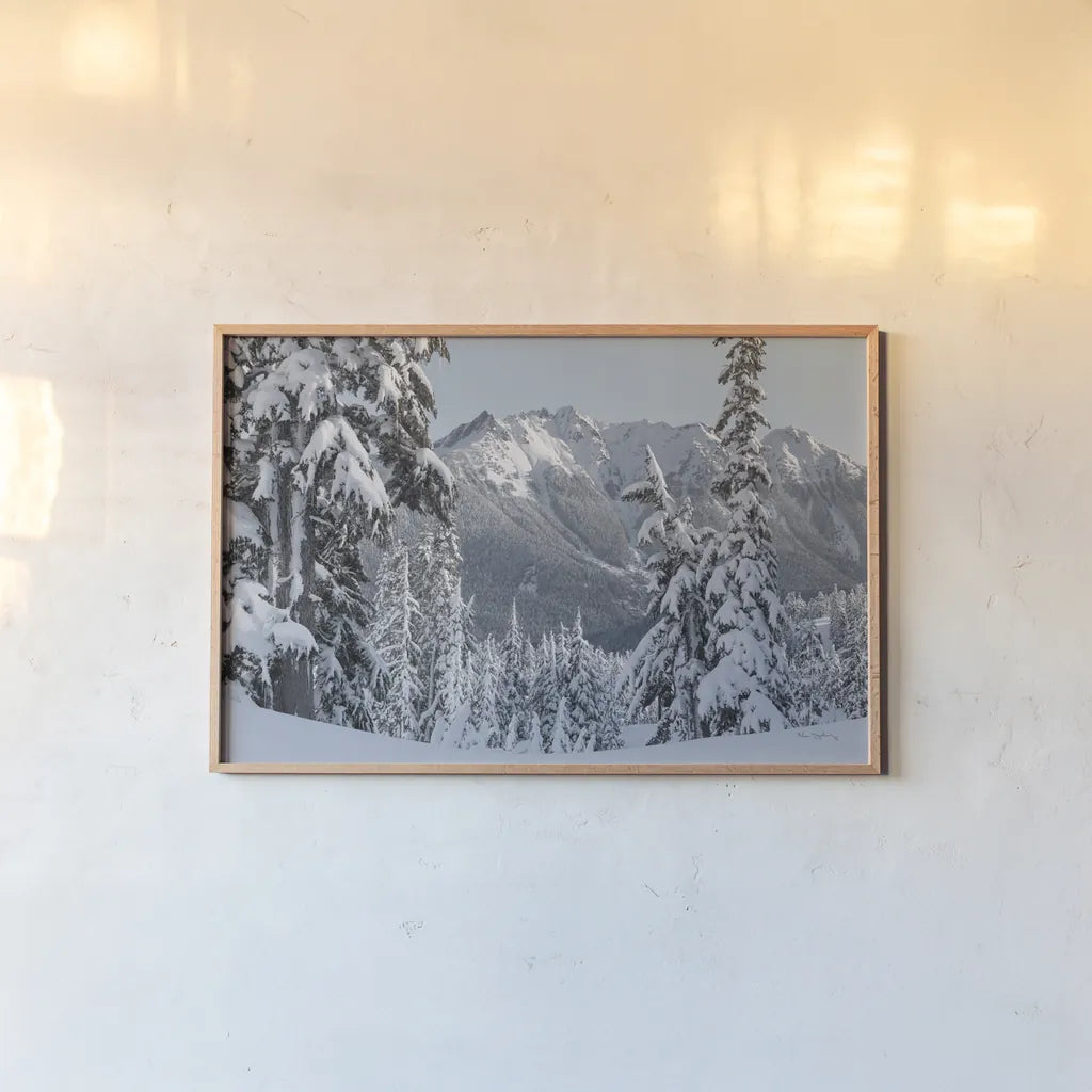 Nooksack Ridge in Winter by Alan Majchrowicz. shown as a paper print in a natural frame. Available as a archival giclee rolled canvas, fine art paper, or poster print. SKU 60625i.