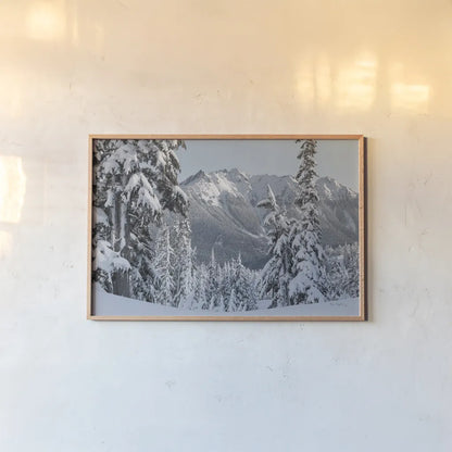 Nooksack Ridge in Winter by Alan Majchrowicz. shown as a paper print in a natural frame. Available as a archival giclee rolled canvas, fine art paper, or poster print. SKU 60625i.