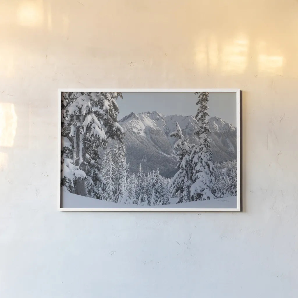 Nooksack Ridge in Winter by Alan Majchrowicz. shown as a paper print in a white frame. Available as a archival giclee rolled canvas, fine art paper, or poster print. SKU 60625i.