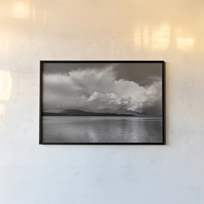 Noon Day Clouds by Alan Majchrowicz. shown as a paper print in a black flame. Available as a archival giclee rolled canvas, fine art paper, or poster print. SKU 43060i.