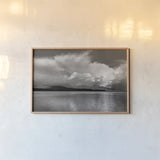 Noon Day Clouds by Alan Majchrowicz. shown as a paper print in a natural frame. Available as a archival giclee rolled canvas, fine art paper, or poster print. SKU 43060i.