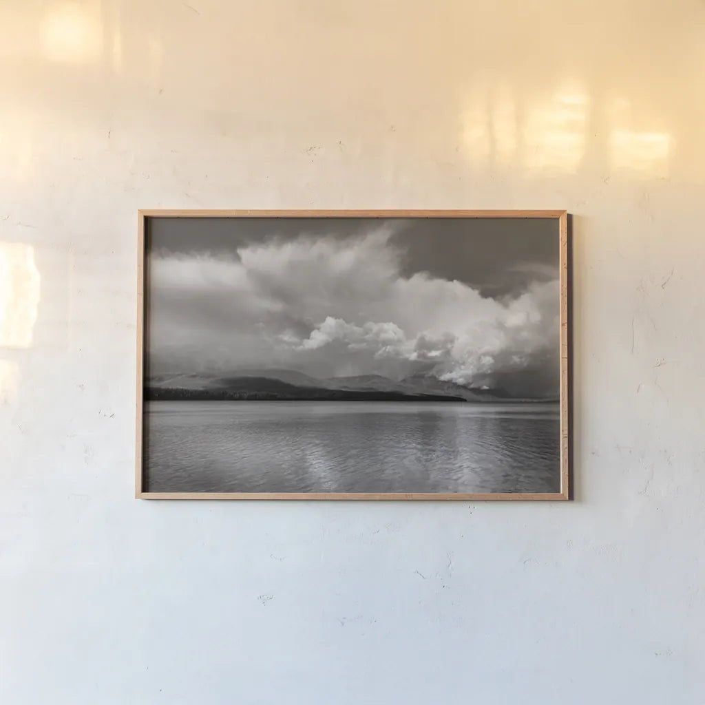 Noon Day Clouds by Alan Majchrowicz. shown as a paper print in a natural frame. Available as a archival giclee rolled canvas, fine art paper, or poster print. SKU 43060i.