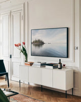Northwest Islands by Alan Majchrowicz. shown as a framed stretched canvas in a living room above a console. Available as a archival giclee rolled canvas, fine art paper, or poster print. SKU 77233i.
