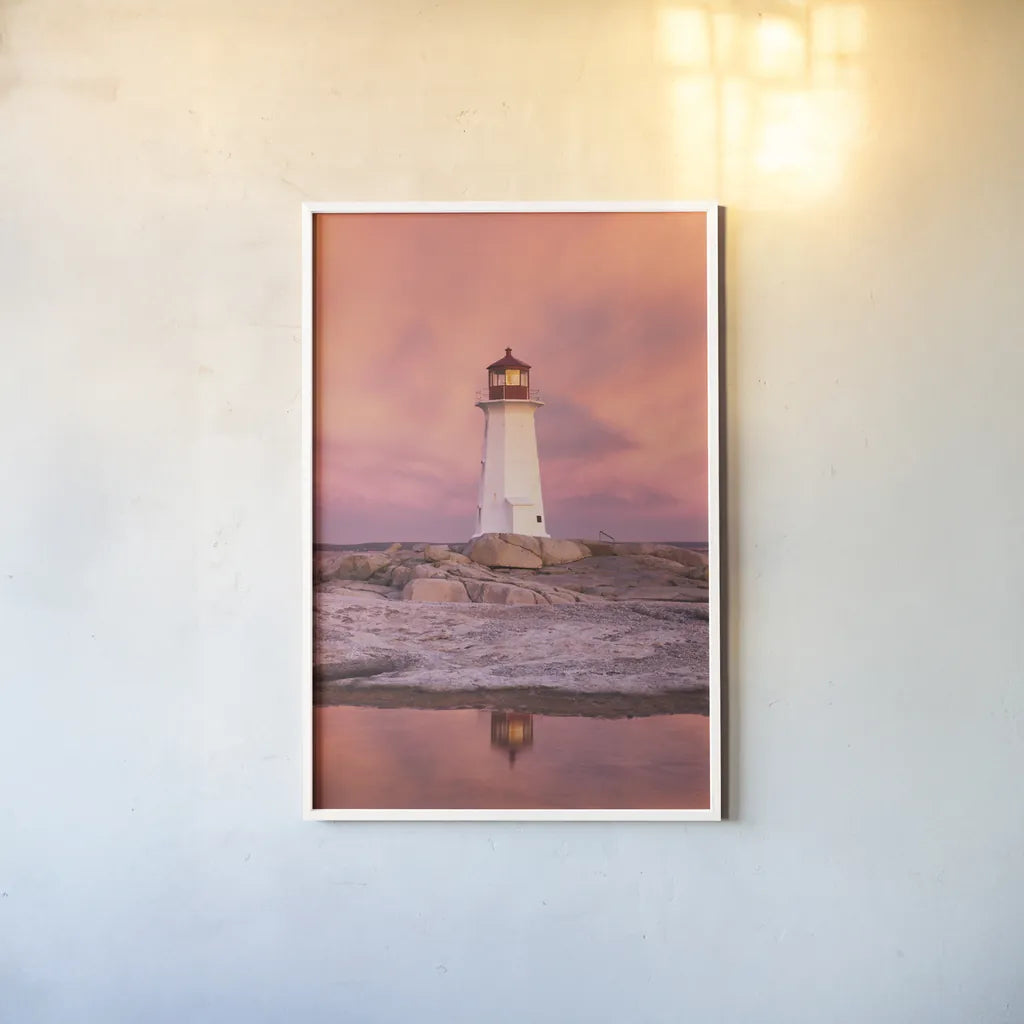Peggys Cove by Alan Majchrowicz. shown as a paper print in a white frame. Available as a archival giclee rolled canvas, fine art paper, or poster print. SKU 46108h.