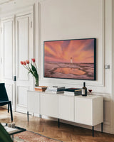 Peggys Cove Nova Scotia by Alan Majchrowicz. shown as a framed stretched canvas in a living room above a console. Available as a archival giclee rolled canvas, fine art paper, or poster print. SKU 47836i.