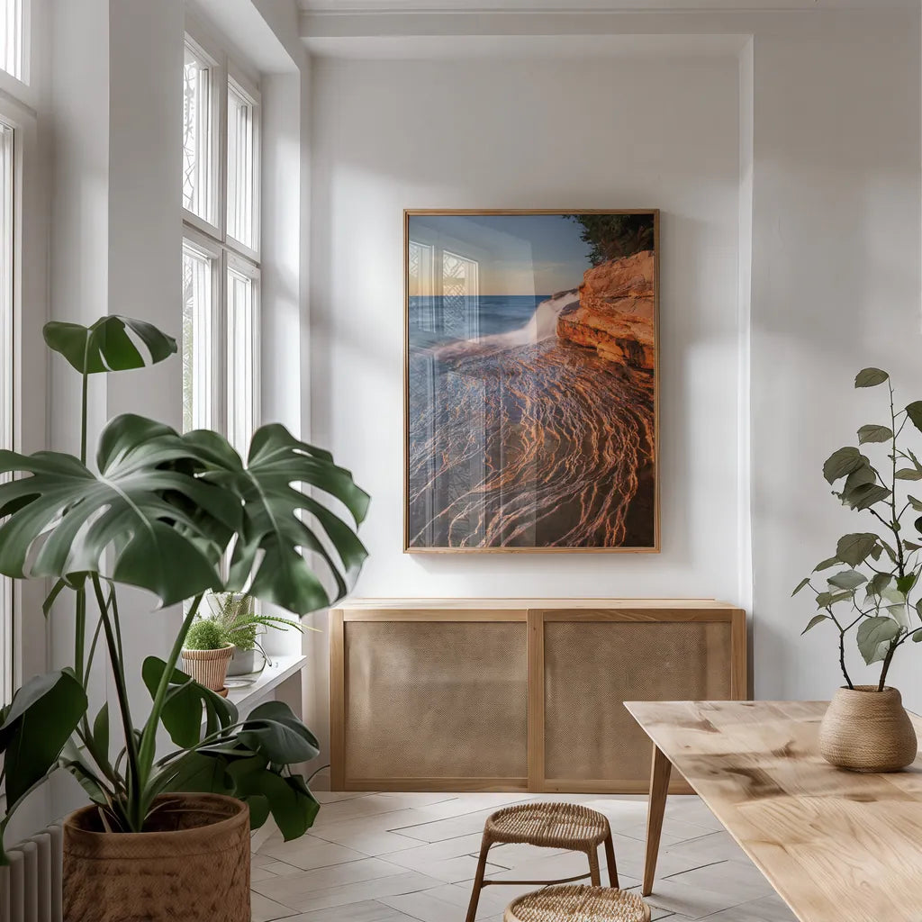 Pictured Rocks Michigan I by Alan Majchrowicz. shown as a print in a natural wood frame in a dining room. Available as a archival giclee rolled canvas, fine art paper, or poster print. SKU 50392h.
