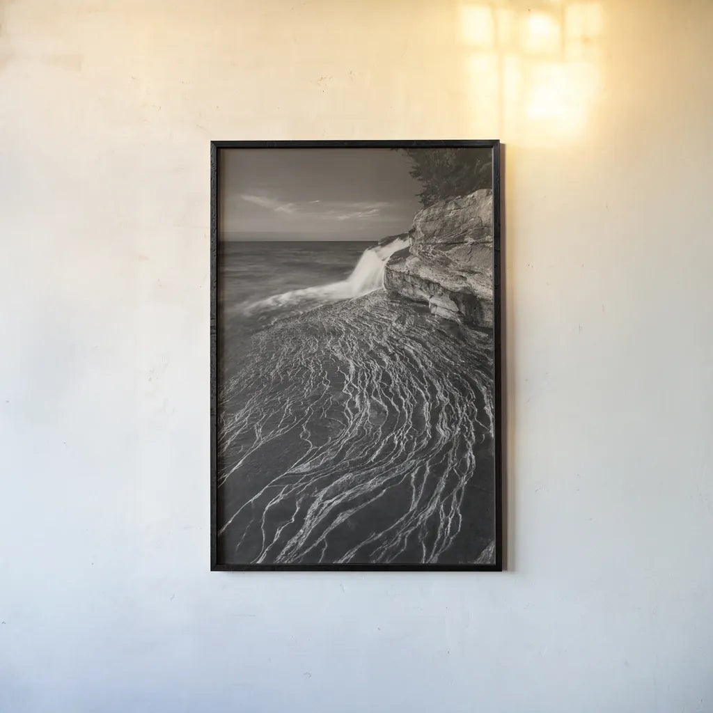 Pictured Rocks Michigan I BW by Alan Majchrowicz. shown as a paper print in a black flame. Available as a archival giclee rolled canvas, fine art paper, or poster print. SKU 50393h.
