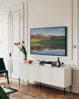 Rocky Mountains Montana by Alan Majchrowicz. shown as a framed stretched canvas in a living room above a console. Available as a archival giclee rolled canvas, fine art paper, or poster print. SKU 28086i.