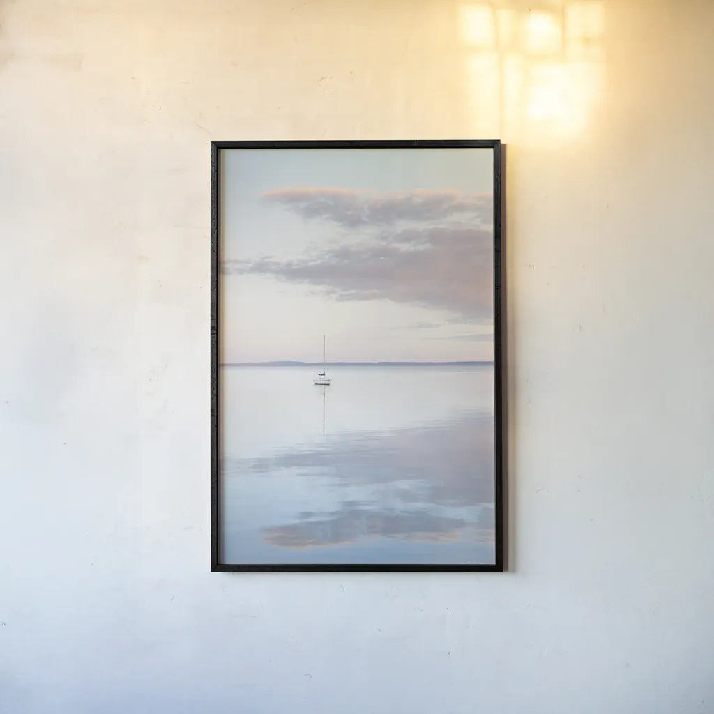 Sailboat in Bellingham Bay II by Alan Majchrowicz. shown as a paper print in a black flame. Available as a archival giclee rolled canvas, fine art paper, or poster print. SKU 61440h.