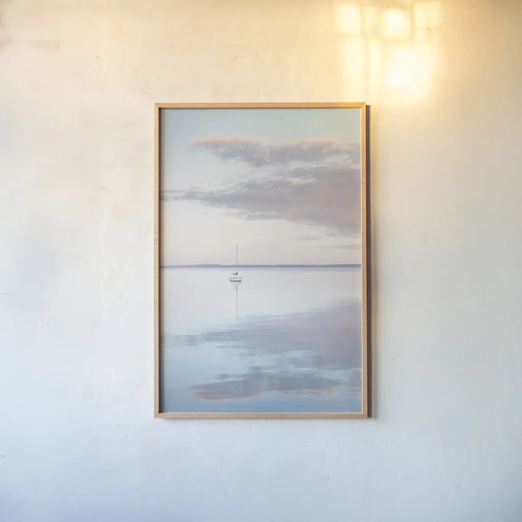 Sailboat in Bellingham Bay II by Alan Majchrowicz. shown as a paper print in a natural frame. Available as a archival giclee rolled canvas, fine art paper, or poster print. SKU 61440h.
