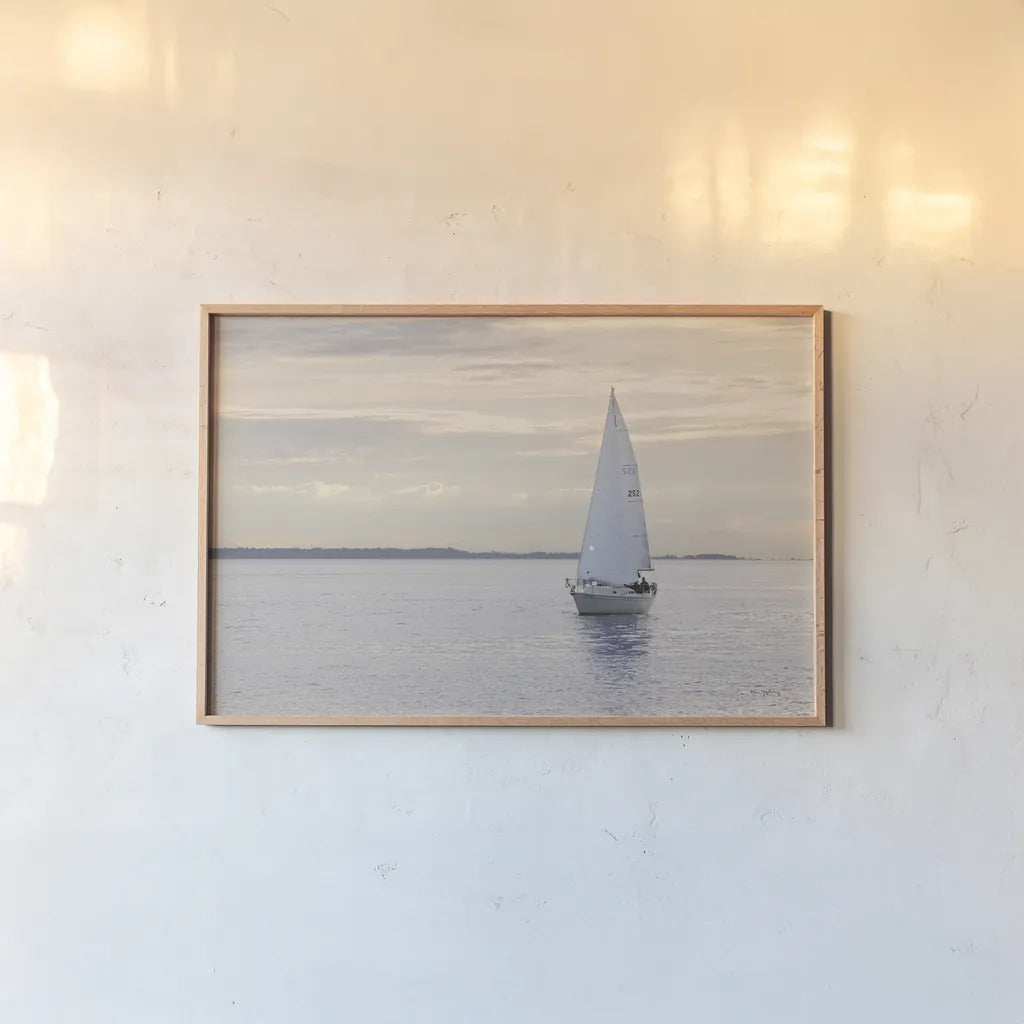 Sailboat in Semiahmoo Bay by Alan Majchrowicz. shown as a paper print in a natural frame. Available as a archival giclee rolled canvas, fine art paper, or poster print. SKU 46112i.