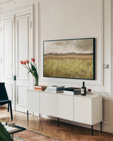 Sawtooth Mountains Idaho II by Alan Majchrowicz. shown as a framed stretched canvas in a living room above a console. Available as a archival giclee rolled canvas, fine art paper, or poster print. SKU 71599i.