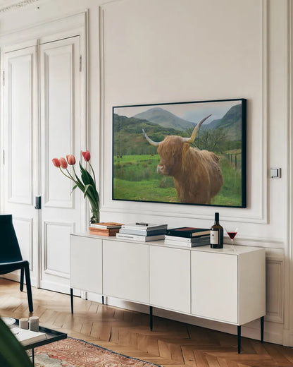 Scottish Highland Cattle IV by Alan Majchrowicz. shown as a framed stretched canvas in a living room above a console. Available as a archival giclee rolled canvas, fine art paper, or poster print. SKU 52304i.