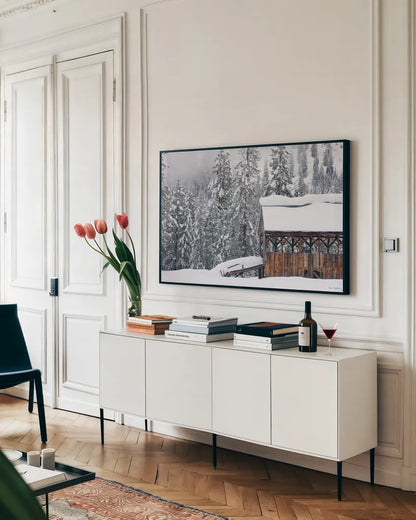 Snow Covered Barn by Alan Majchrowicz. shown as a framed stretched canvas in a living room above a console. Available as a archival giclee rolled canvas, fine art paper, or poster print. SKU 16154i.