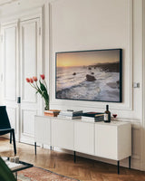 Sonoma Coast Sunset by Alan Majchrowicz. shown as a framed stretched canvas in a living room above a console. Available as a archival giclee rolled canvas, fine art paper, or poster print. SKU 90653i.