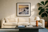 Sonoma Coast Sunset Square by Alan Majchrowicz. Displayed in a glass frame with matte in a clean modern living room. Available as an archival giclee rolled canvas, fine art paper, or poster print. SKU 95069a.