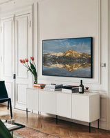 South Sister Reflection I by Alan Majchrowicz. shown as a framed stretched canvas in a living room above a console. Available as a archival giclee rolled canvas, fine art paper, or poster print. SKU 28096i.