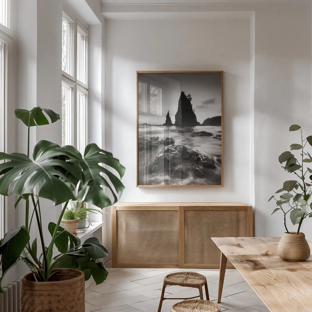 Split Rock Rialto Beach by Alan Majchrowicz. shown as a print in a natural wood frame in a dining room. Available as a archival giclee rolled canvas, fine art paper, or poster print. SKU 64548h.