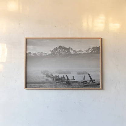 Stanley Basin Fence and Fog by Alan Majchrowicz. shown as a paper print in a natural frame. Available as a archival giclee rolled canvas, fine art paper, or poster print. SKU 64561i.