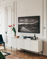 Stanley Basin Road by Alan Majchrowicz. shown as a framed stretched canvas in a living room above a console. Available as a archival giclee rolled canvas, fine art paper, or poster print. SKU 64563i.